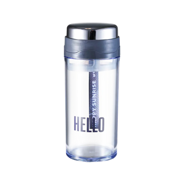 Clear reusable PP plastic water bottle with straw on office desk, showing convenient drinking opening and refill routine for daily hydration home and office use.